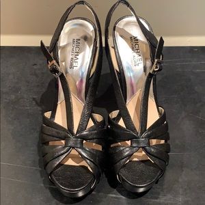 Michael Kors black strappy sandals.